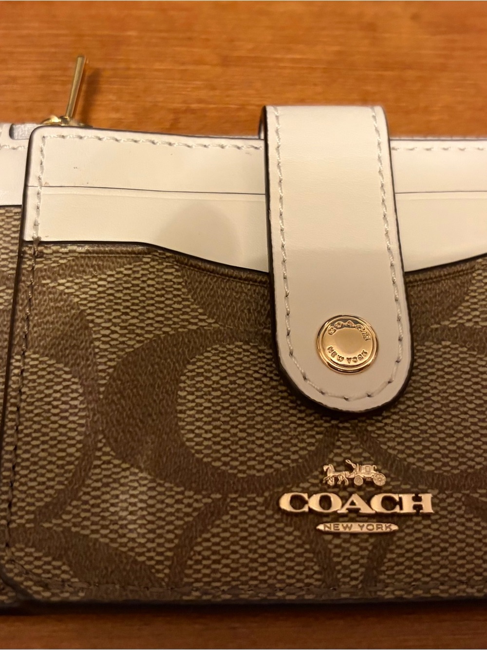 Coach Brown Signature canvas card holder with cream trim